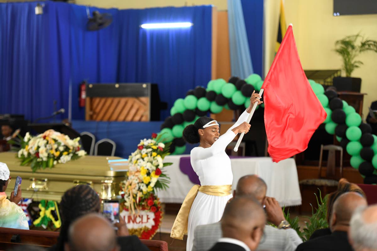 Amaya Lewis, family friend, delivers a dance piece at the funeral.